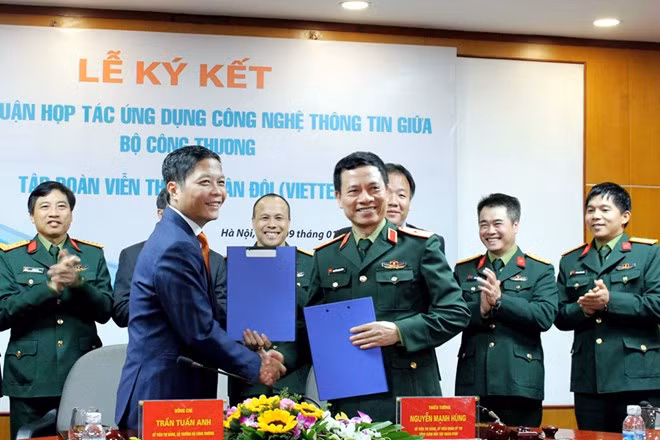 Firman acuerdo para el desarrollo de comercio electrónico en Vietnam ảnh 1