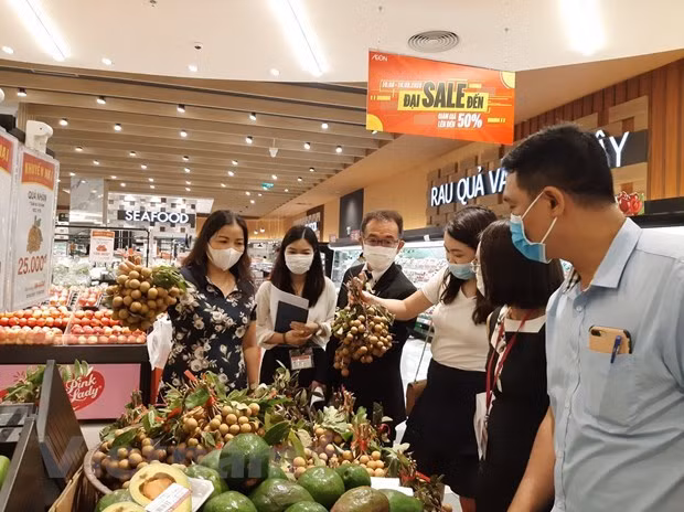 Productos vietnamitas afirman su posición en mercado nacional ảnh 2