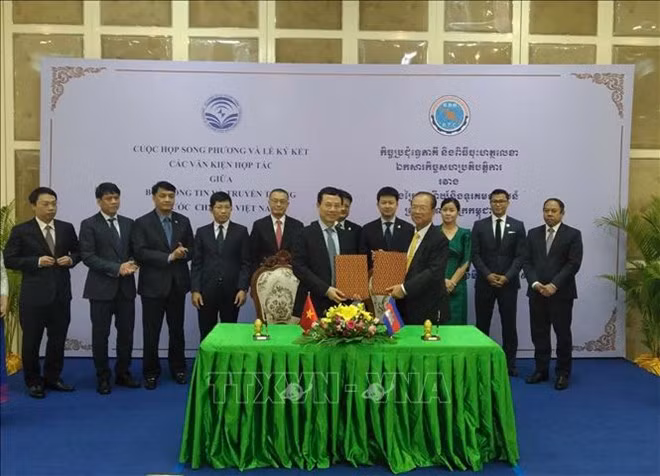 Firman Vietnam y Camboya acuerdos de cooperación telecomunicaciones e informática ảnh 1