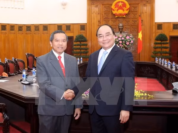 Vietnam y Laos comparten experiencias en desarrollo científico ảnh 1