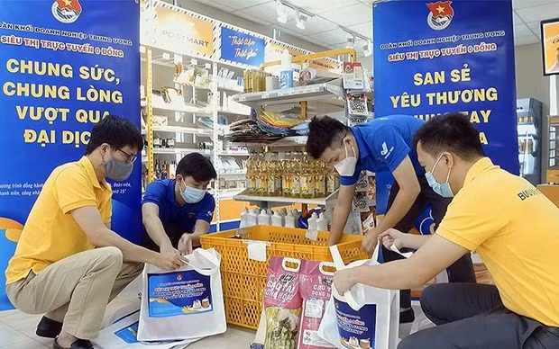 Vietnam “no deja a nadie atrás” en la “tormenta” de COVID-19 ảnh 8