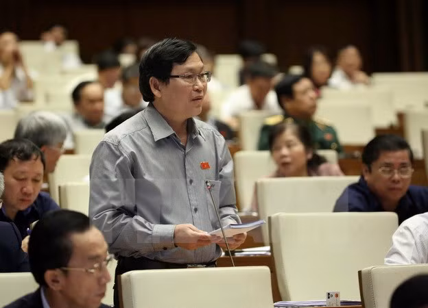 Parlamento vietnamita interpela a titulares de rama agrícola y comercial ảnh 1