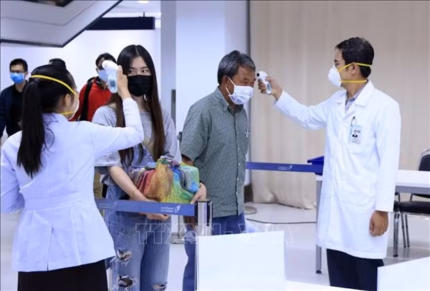 Laos registra cuatro dígitos en nuevos casos de COVID-19 ảnh 1