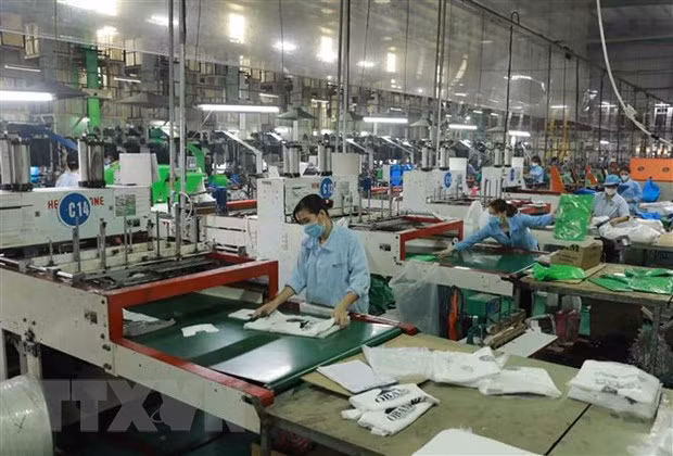 PIB de Vietnam se recuperará con fuerza en 2022, según Standard Chartered y HSBC ảnh 2