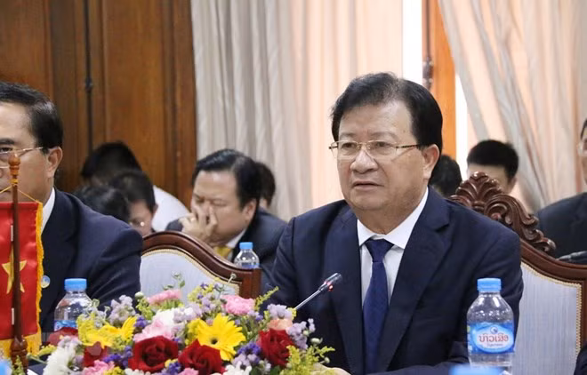 Destacan dirigentes laosianos el desarrollo fructífero de los nexos con Vietnam ảnh 1