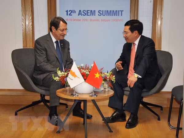 Vicepremier y canciller de Vietnam continúa con agenda apretada al margen de ASEM ảnh 1