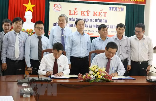 Firman VNA y provincia vietnamita acuerdo de cooperación informativa ảnh 1