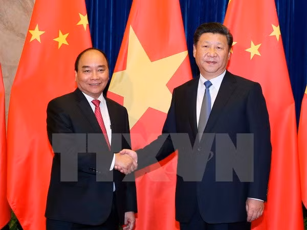 Primer ministro de Vietnam se reúne con Xi Jinping ảnh 1