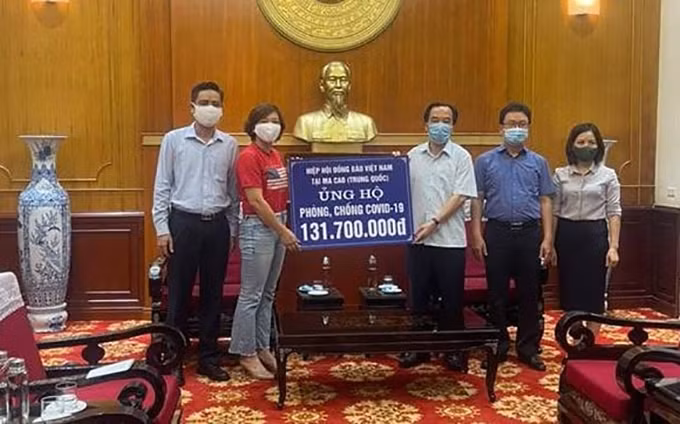 Vietnamitas en Macao apoyan a su país de origen en lucha contra el COVID-19 ảnh 1