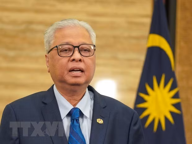 Primer ministro de Malasia felicita a 31 medallistas de SEA Games 31 ảnh 1