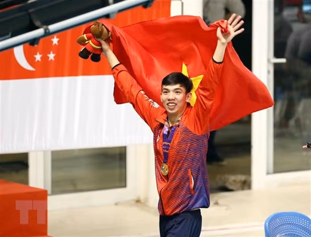 Honran a deportistas sobresalientes de Vietnam en los SEA Games 31 ảnh 1