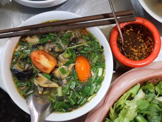 [Foto] Bun oc, un auténtico plato de Hanoi ảnh 4