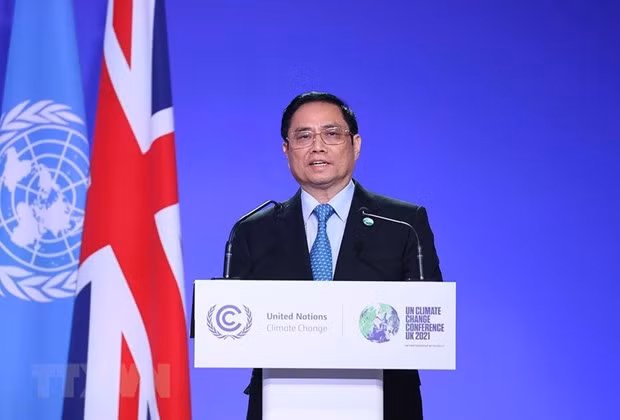 Destacan éxito de la participación en COP26 y visitas al Reino Unido y Francia del premier de Vietnam ảnh 1
