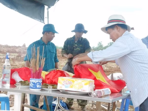 Repatriados restos de mártires vietnamitas caídos en Laos ảnh 1
