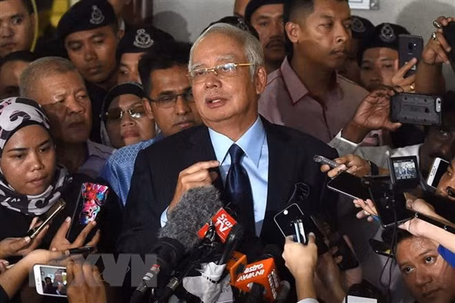 Detienen a expremier malasio por modificación de informe de auditoría de 1MDB ảnh 1