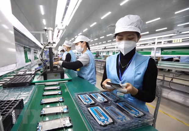 Con alta determinación, Vietnam acelera recuperación socioeconómica ảnh 1