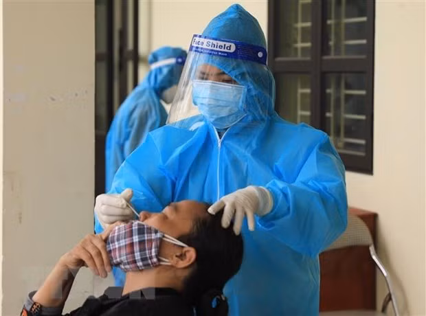 Vietnam registra 164 mil 596 nuevos casos del COVID-19 ảnh 1