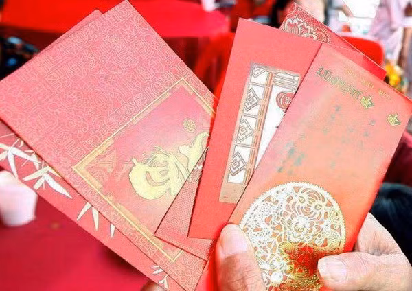  Regalar dinero para buena suerte en el Tet ảnh 1