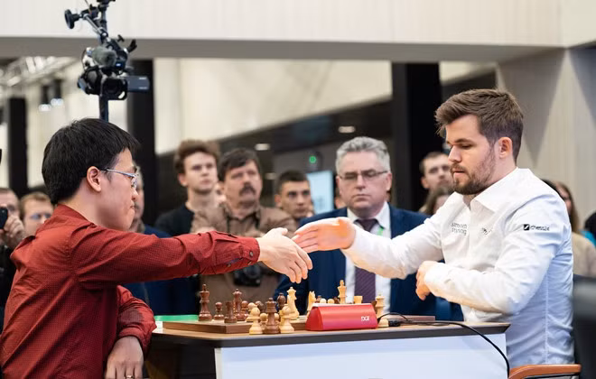 Derrota ajedrecista vietnamita Quang Liem al campeón mundial ảnh 1