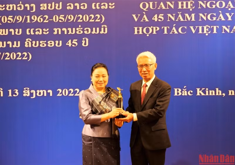 Conmemoran aniversario de relaciones Vietnam-Laos en China ảnh 1