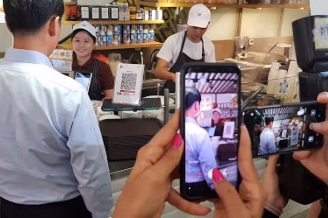 Singapur aplicará un sistema unificado para el pago con código QR ảnh 1