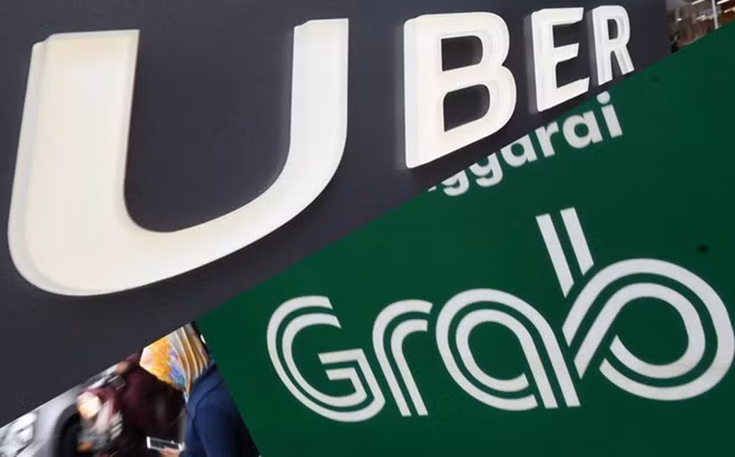 Grab y Uber sufren multa de cerca de 10 millones de dólares en Singapur ảnh 1