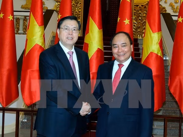 Premier de Vietnam enfatiza solución para impulsar comercio con China ảnh 1