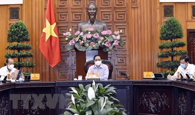 Premier vietnamita destaca importancia de participación de pobladores en lucha contra el COVID-19 ảnh 2 Premier vietnamita destaca importancia de participación de pobladores en lucha contra el COVID-19 ảnh 2