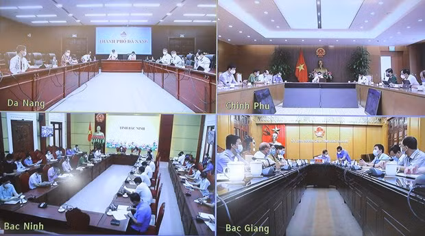 Exigen evitar propagación de COVID-19 en zonas industriales de Vietnam ảnh 3