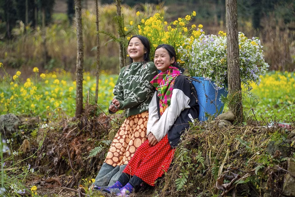 La belleza de la gente combinada con el paisaje también es una atracción para los turistas en Ha Giang. (Foto: VNA)