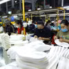Producción de suelas de zapatos en la empresa con inversión japonesa Kepai en el Parque Industrial Tan Kim en Tay Ninh. Foto: VNA
