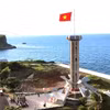 El mástil que simboliza la soberanía en la isla de Con Co. Foto: VNA