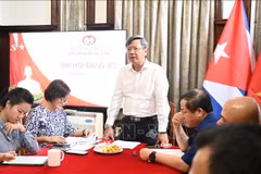 El embajador Le Quang Long habla en la cita. (Foto: VNA)