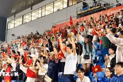 Aficionados vietnamitas celebran la victoria frente a Filipinas. (Foto: Vietcontent)