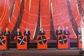 El primer ministro Pham Minh Chinh y los delegados participan en la ceremonia de inauguración de la Feria de Primavera de 2026 (Fuente: VNA)