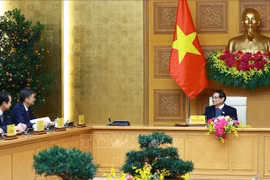 El primer ministro de Vietnam, Pham Minh Chinh, recibe a Chen Gang, secretario del Comité del Partido Comunista de China en Guangxi. (Fuente: VNA)