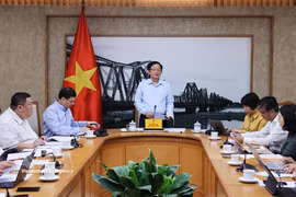 El viceprimer ministro Ho Quoc Dung preside la reunión para acordar un indicador y una metodología que permitan medir la contribución de la economía digital al producto interno bruto (PIB). (Foto: VNA)